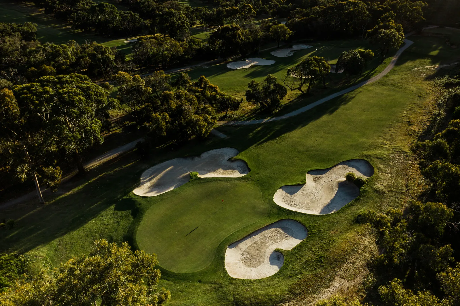 Bunkers around a green at Anglesea Golf Club from above