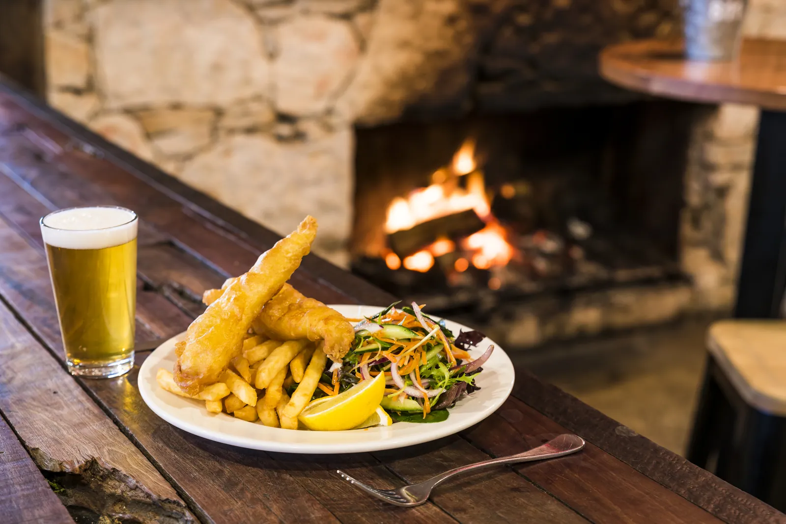 Food and a drink served at the Aireys Pub