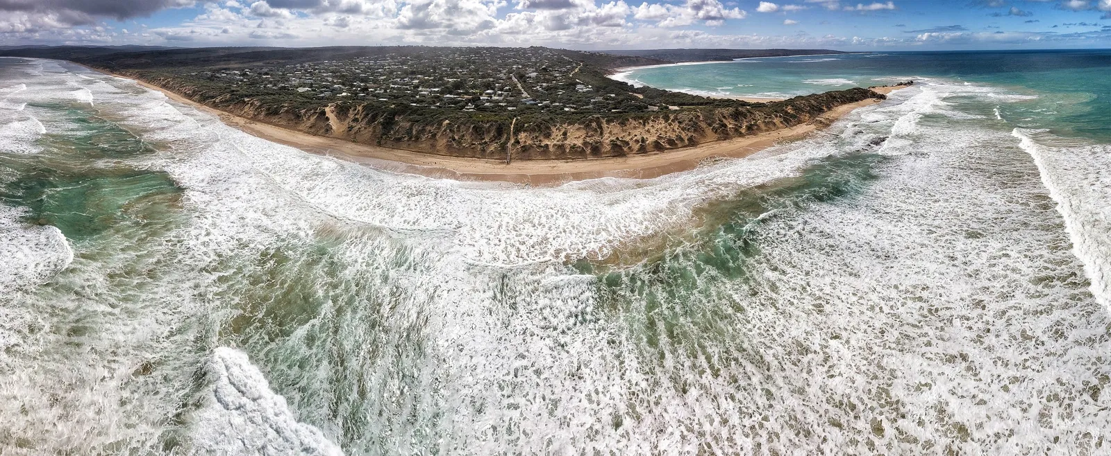 Aerial panorama of Point Roadknight and its back beach, Anglesea