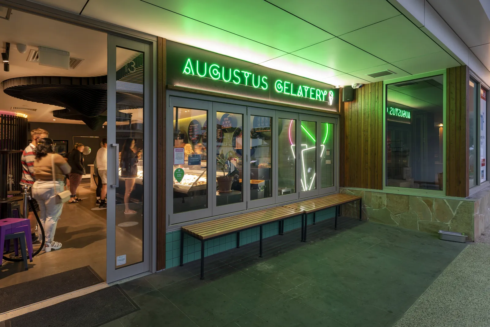 The Augustus Gelatery shopfront on Gilbert Street, Torquay, with its green neon sign