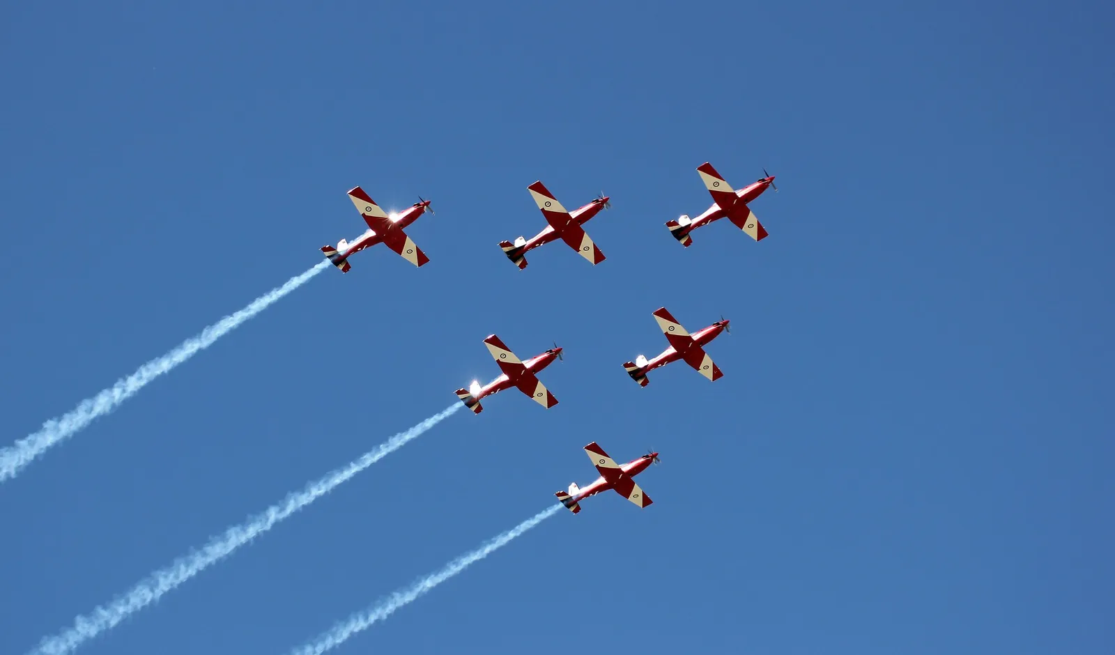 The RAAF Roulettes flying in formation trailing smoke at the 2011 Avalon Airshow