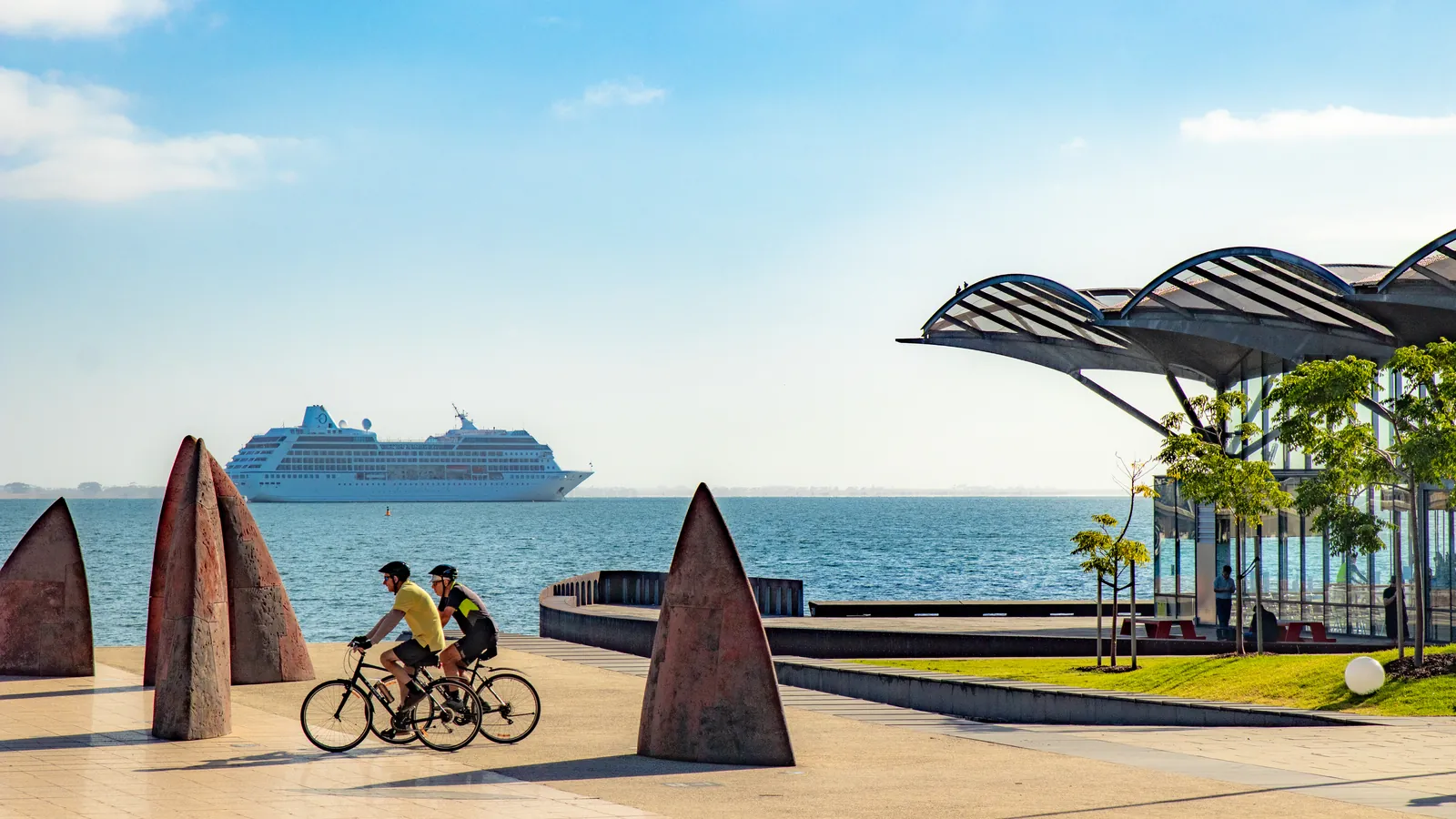 A cyclist riding the foreshore path beside Corio Bay