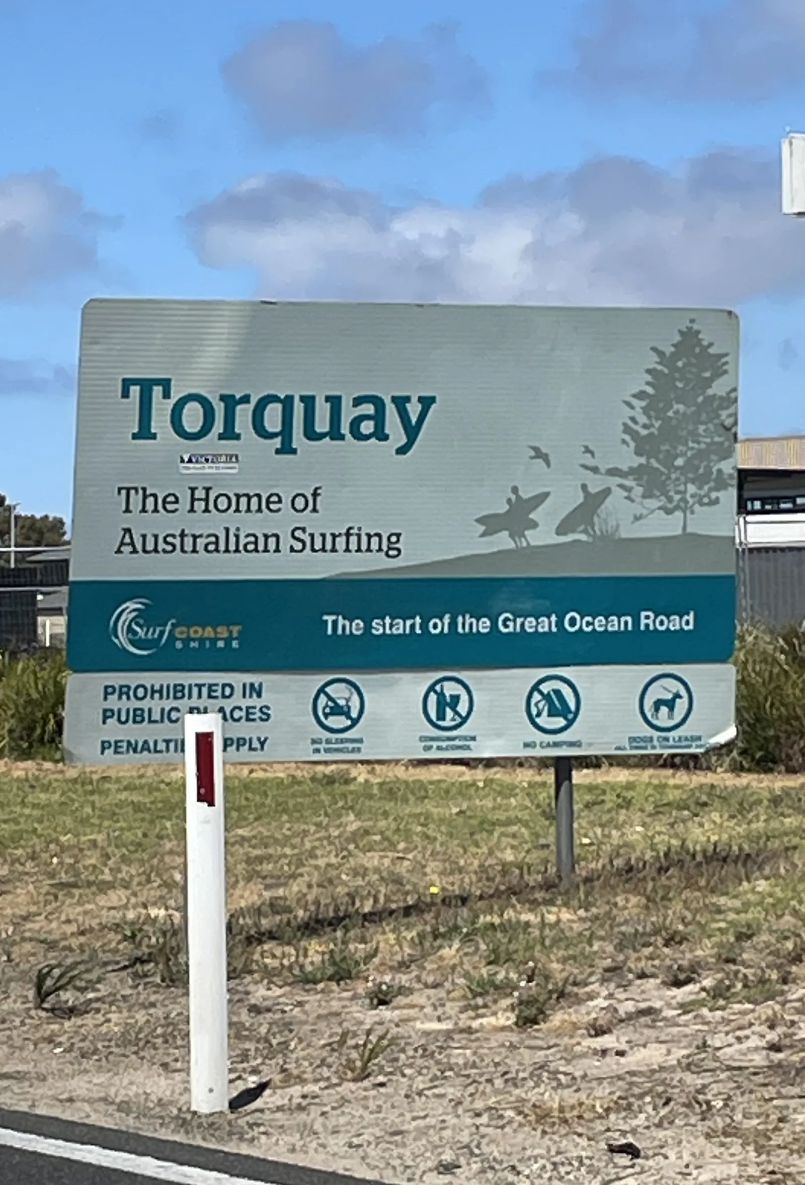 The Torquay entrance sign reading home of Australian surfing