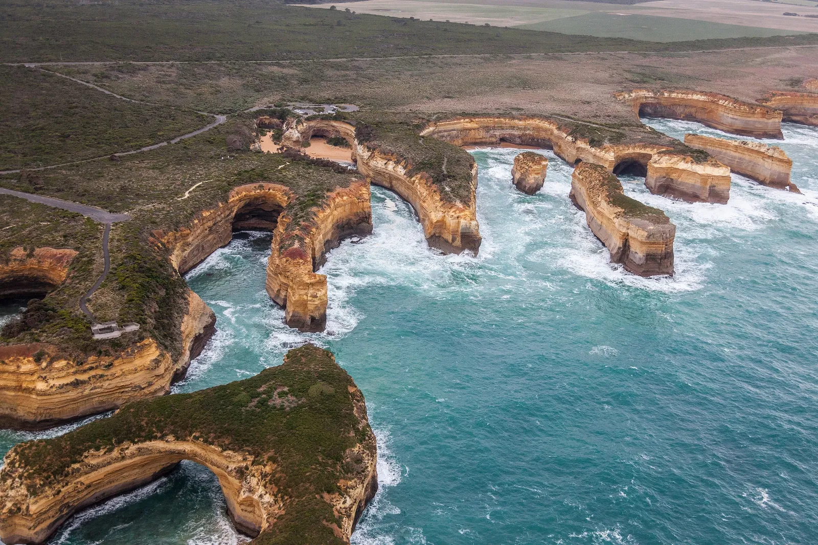 Aerial view of Loch Ard Gorge and the eroded limestone coast near Port Campbell