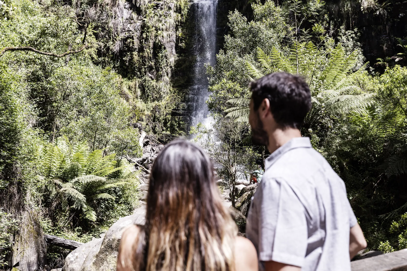A couple looking at Erskine Falls near Lorne