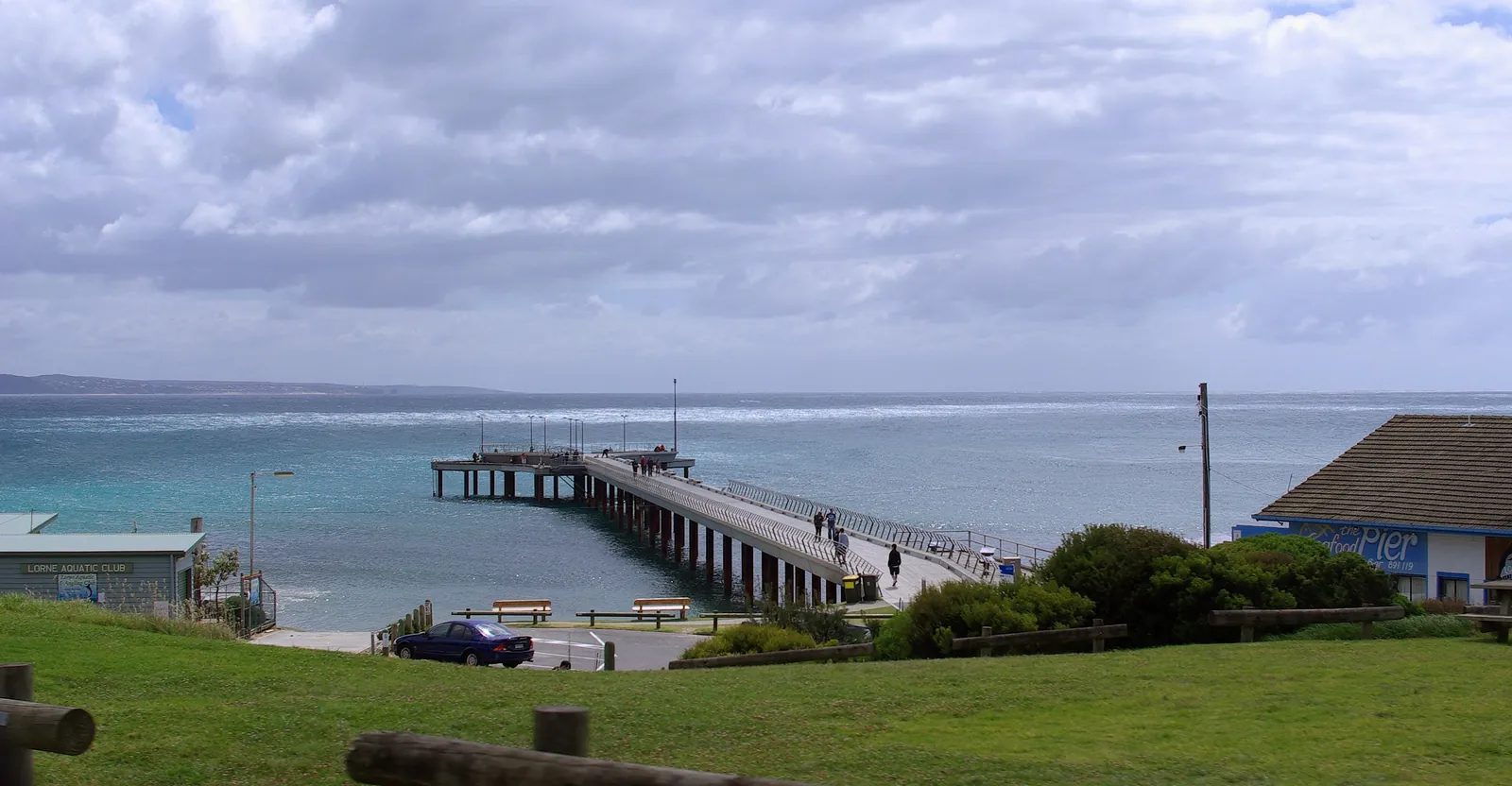 Lorne pier reaching into Loutit Bay from the foreshore lawn