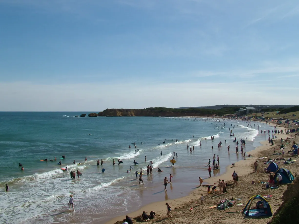 Torquay Surf Beach crowded with swimmers, seen from the lookout near Point Danger