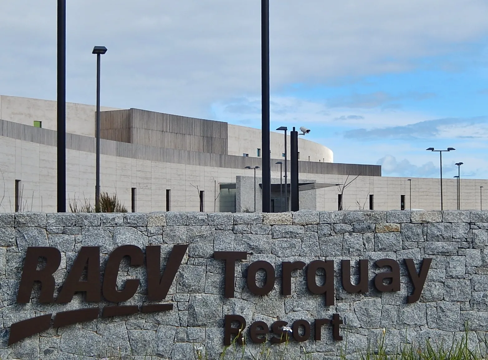 The RACV Torquay Resort sign and resort building