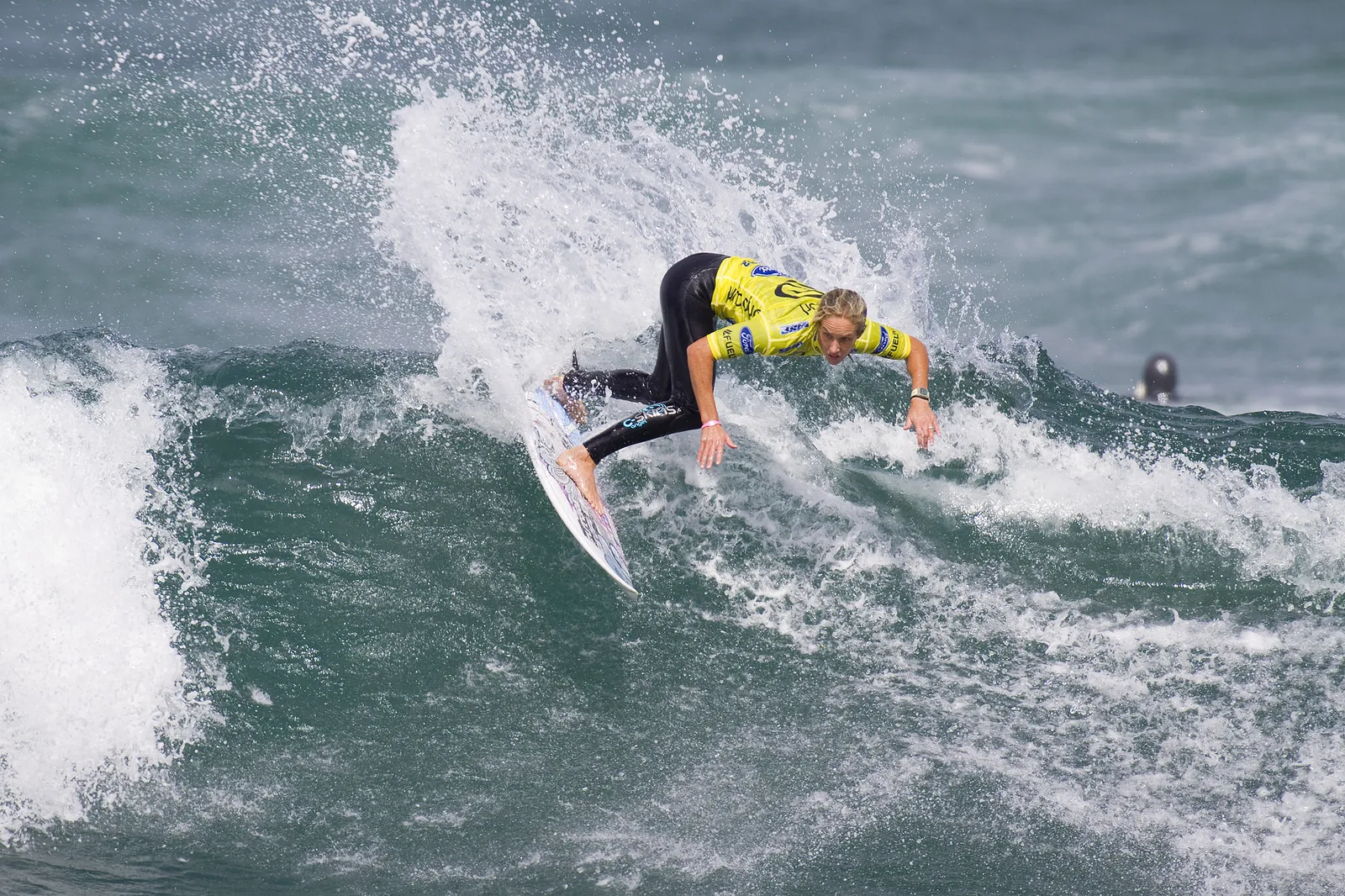 A competitor carving a turn on a wave at the 2010 Rip Curl Pro, Bells Beach