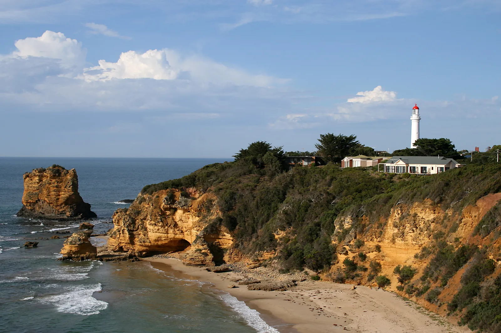 Split Point Lighthouse and keepers' cottages above the sandstone cliffs and Eagle Rock, Aireys Inlet
