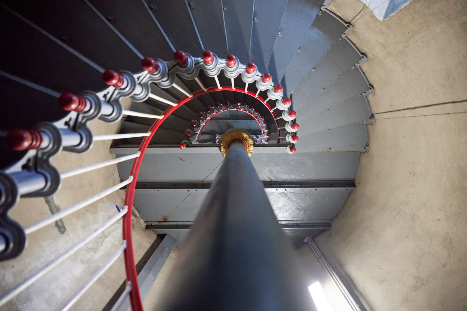 Looking up the spiral staircase inside Split Point Lighthouse